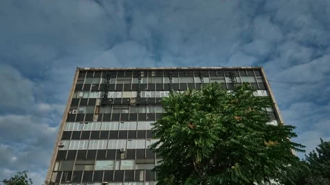 Timelapse building tree movement clouds sky Stock Footage 139505095