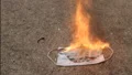 timelapse burning of surgical mask close up Video HD