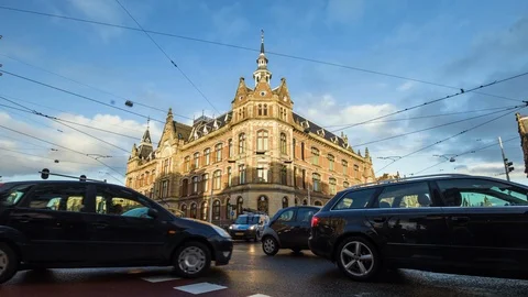Timelapse of Busy Amsterdam Intersection at Conservatorium Hotel Stock Footage 127155526