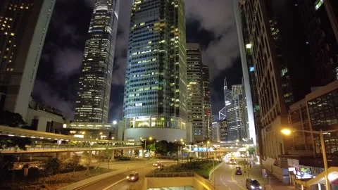 Timelapse of Busy Car Traffic in front of a Skyscraper Stock Footage 164278271