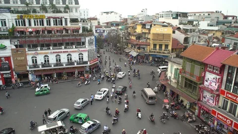 Timelapse of Busy Intersection With Traffic In Hanoi wide shot, Vietnam Stock-Footage 92805687