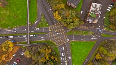Timelapse of a busy junction with traffic lights in Swansea, Wales Stock Footage 255968627