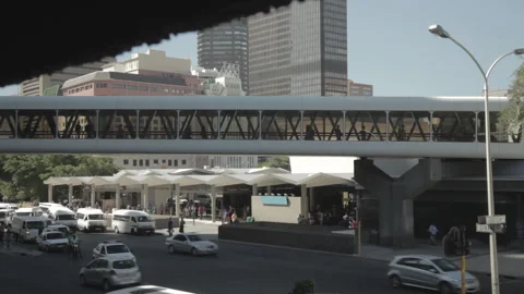 Timelapse: busy traffic intersection with pedestrians and vehicles Stock Footage 242007520