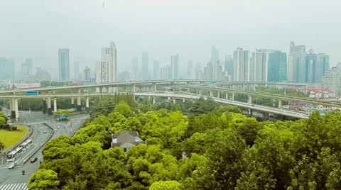 Timelapse of busy traffic over overpass in modern city , Shanghai, China Stock Footage 39657995