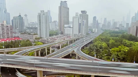 Timelapse of busy traffic over overpass in modern city , Shanghai, China Stock Footage 39711044