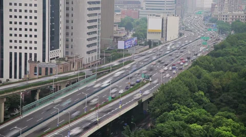 Timelapse of busy traffic over overpass in modern city , Shanghai, China Stock Footage 39713299
