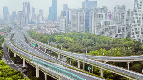 Timelapse of busy traffic over overpass in modern city , Shanghai, China Stock Footage 39716078