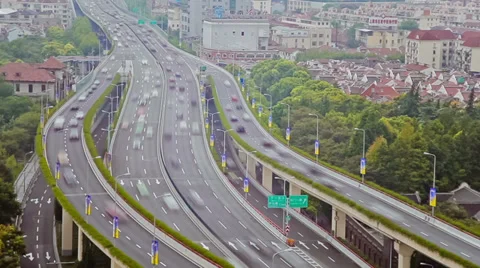 Timelapse of busy traffic over overpass in modern city , Shanghai, China Stock Footage 39717913