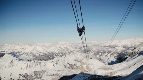 Timelapse of cable car of Glacier 3000 in Swiss Alps. Ski lift rides down Stock Footage 224537437