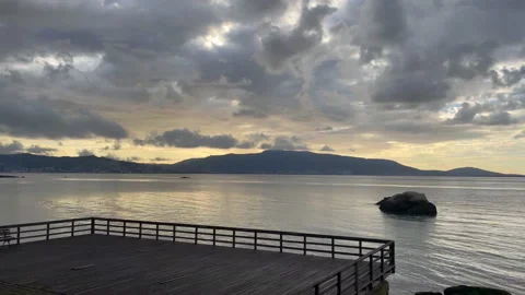 Timelapse calm sea with heavy clouds, storm coming on the high seas. Stock Footage 163483925