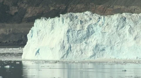 Timelapse of calving event on high glacier wall collapse arctic Stock Footage 60000181