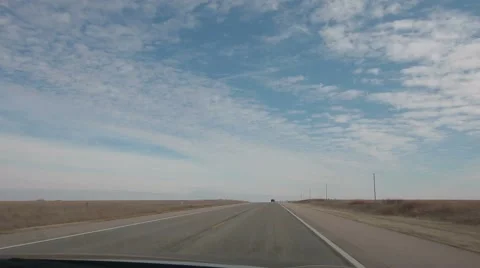 Timelapse of car driving on open highway Stock Footage 57401927
