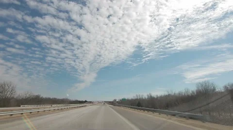 Timelapse of car driving through town to highway Stock Footage 57401870