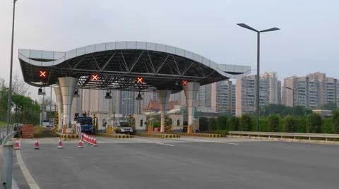 Timelapse of car vehicle and trucks are passing the toll booth on the highway Stock Footage 40620341