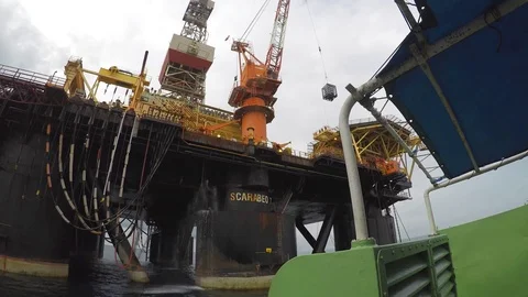 Timelapse of cargo operations offshore, crane operation of lifting from the boat Video stock 83783568