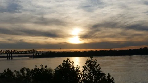 Timelapse of cargo ships sailing in river at sunset Stock Footage 88909256