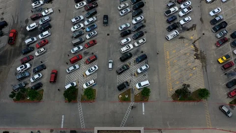 Timelapse of cars and people in a grocery store parking lot, Bryan, Texas, USA Stock Footage