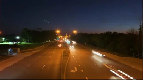 Timelapse of cars at night on highway with motion blur Stock Footage