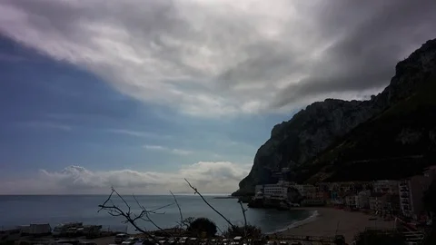 Timelapse of Catalan Bay Beach in the Shadow of the Rock of Gibraltar Stock Footage 77407855