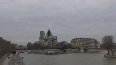 Timelapse of Cathedral Notre Dame de Paris and Île de la Cité church river sena Stock Footage 10760120