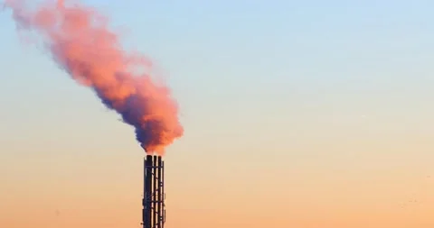 Timelapse of a chimney with smoke during sunset Stock Footage 143676515