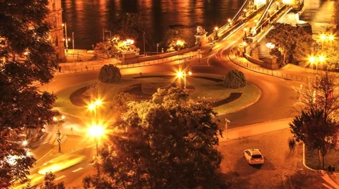 Timelapse of a circle traffic at the riverside in Budapest at night 스톡 동영상 45974522