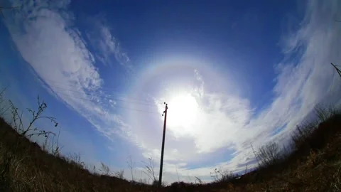 Timelapse of cirrus clouds in the sky with halo Stock Footage 201918141
