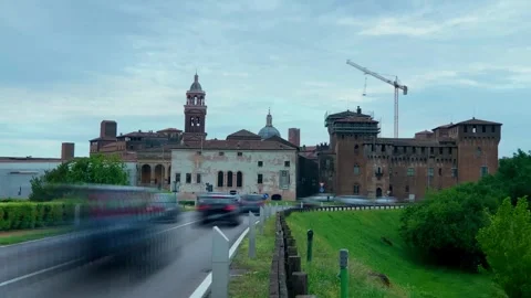 Timelapse of city with a castle, dark clouds and traffic. Stock Footage 240749354