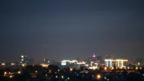 TimeLapse. City landscape. Clouds over the night city with neon light Stock Footage 93935296