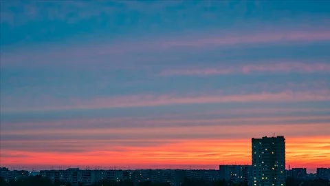 TimeLapse. City landscape. The setting sun, beautiful clouds, against the Video stock 93946192