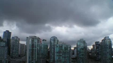 Timelapse of city with rain clouds above Stock Footage 10750704