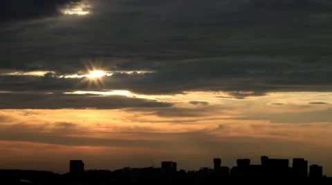 Timelapse of city sunset with dark clouds Stock Footage 11331976