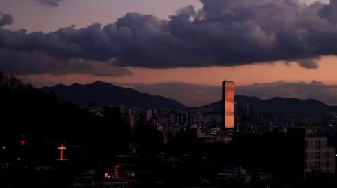 Timelapse of cityscape and clouds Stock Footage 9451628