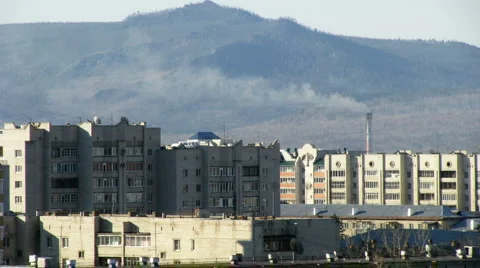Timelapse of cityscape with smoking pipe Видео 921348