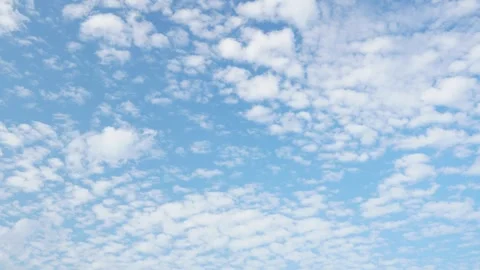Timelapse clear blue sky with a few clouds Video stock 313716807