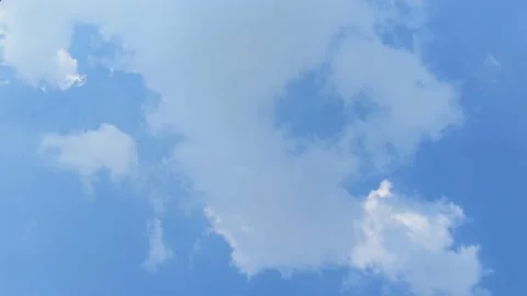 Timelapse of clear clouds and blue sky Stock Footage 160562569