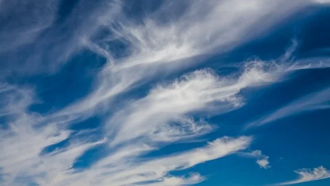 Timelapse clip of white clouds against the blue sky Stock Footage 75778091