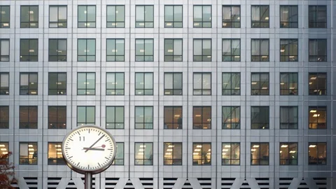 Timelapse of a clock and office at dusk Video stock 103943805