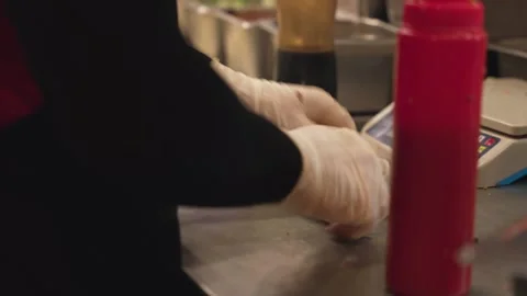 Timelapse Close up of Chef Assembling many Shawarma Wraps with Grilled Meat and Stock Footage 341780184