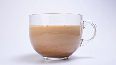Timelapse close-up of coffee dissolving in a cup Video stock 147499833