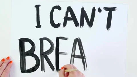 Timelapse. close-up, hand writes slogan - I Cant Breathe - with brush, using Stock Footage 132004102
