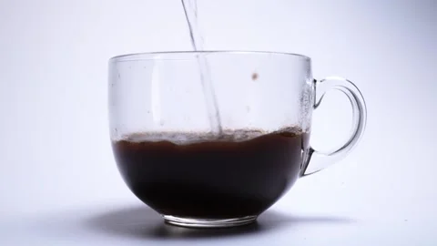 Timelapse close-up of making coffee in a transparent cup Stock Footage 147499851