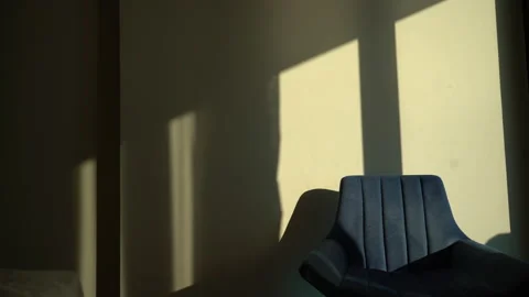 Timelapse Close Up of window shutters' shadow on a wall in the morning sun Stock Footage 180950454