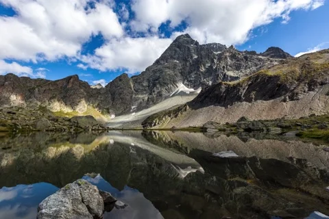 Timelapse of cloud above the mountain "Le Sirac" in the Massif des Ecrins Stock Footage 139798702