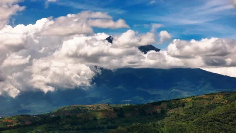 Timelapse of cloud activity around volcanoes Video stock 253599697