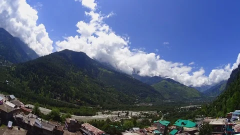 Timelapse cloud in the mountain valley and village Stock Footage 94360616