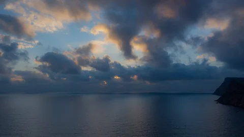 Timelapse of cloud movement over the sea 4K Video stock 124641927
