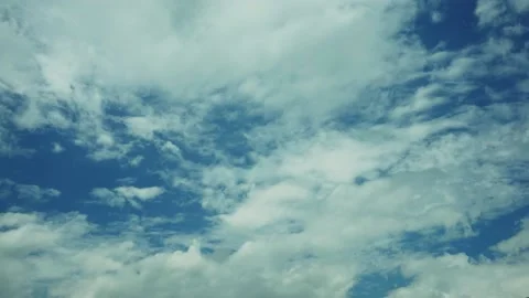 Timelapse of cloud passing by blue sky and sunshine Stock Footage 134366849