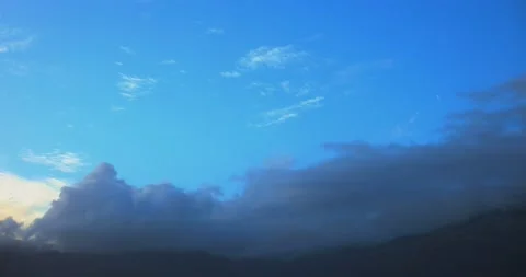 Timelapse clouds above high mountain. Stock Footage 240054358
