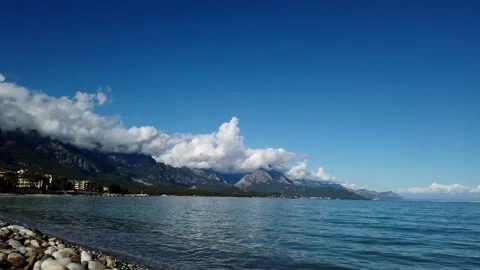 Timelapse of clouds above the mountains and sea Stock Footage 132513762